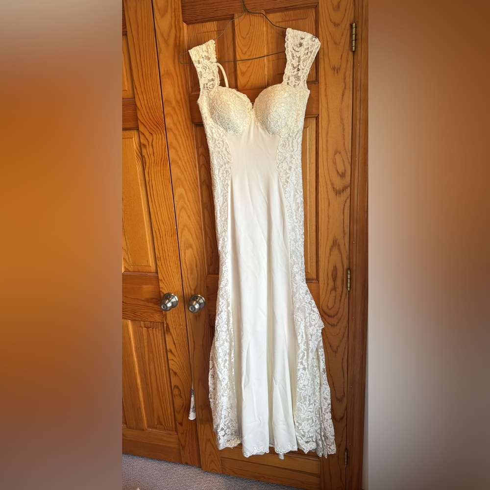 L’Fay Bridal wedding dress.
Original price $4250